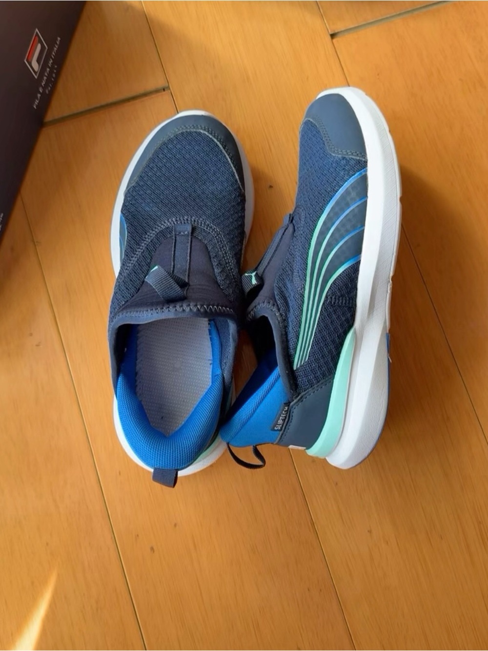 Puma Kids Navy, Aqua & Light Blue Slip-On Sneakers